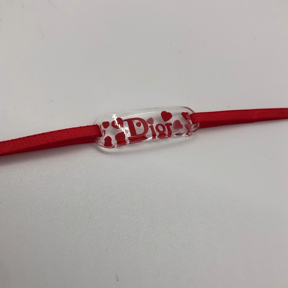 SOLD!! Dior Red Heart Lucite Ribbon Bracelet